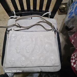 IO Pelle Italy Skull Embossed Leather Crossbody Bag In A Light Beigh Used